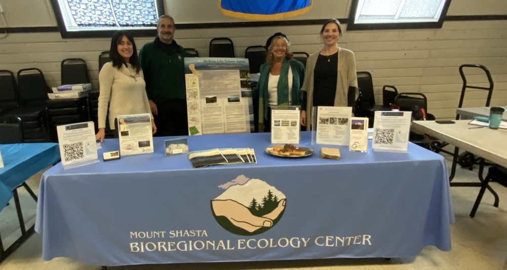 MSBEC staff and Board President at the organizations table during a Pit River Tribe event in Burney.